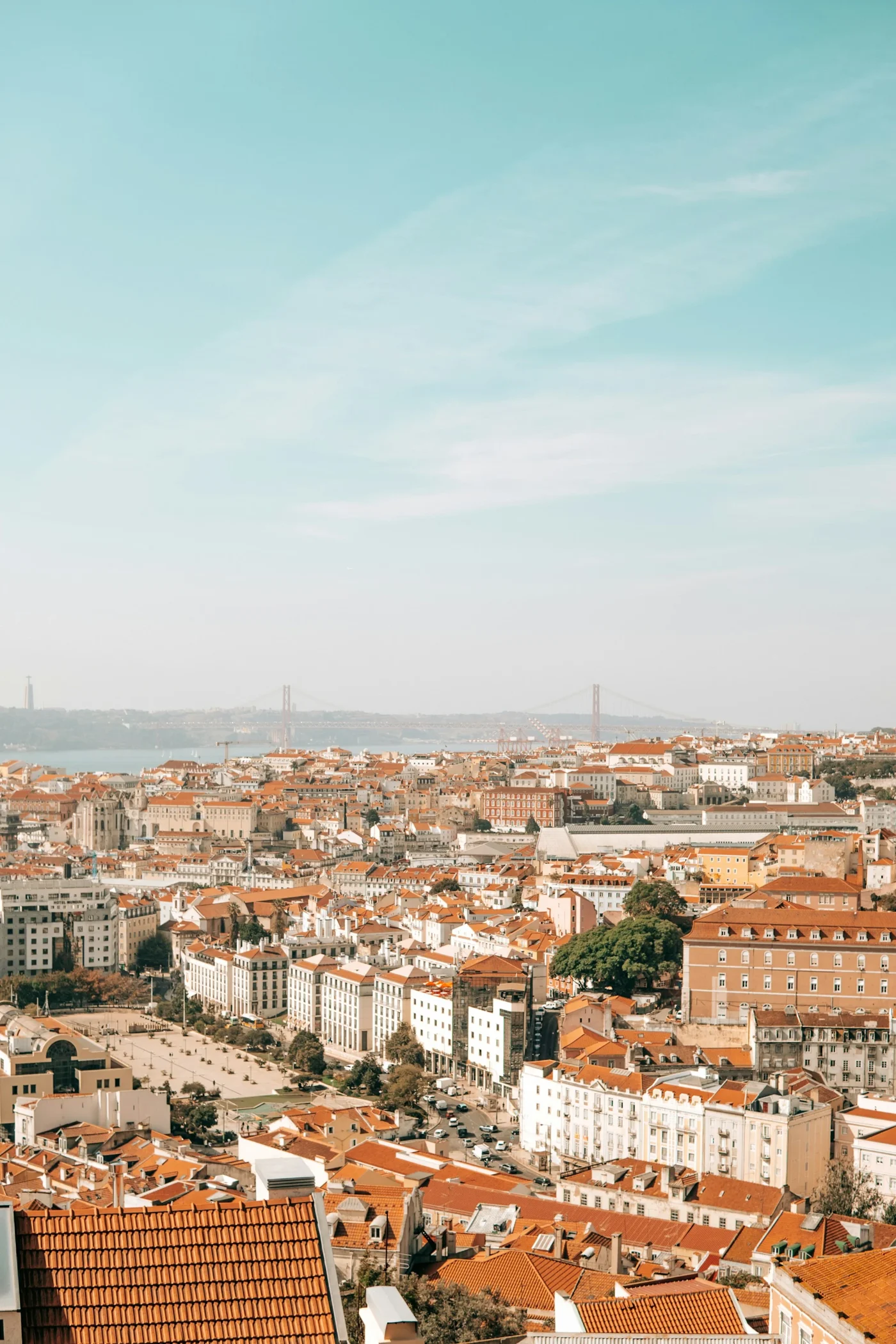 Terracotta rooftops and historic architecture overlooking Lisbon