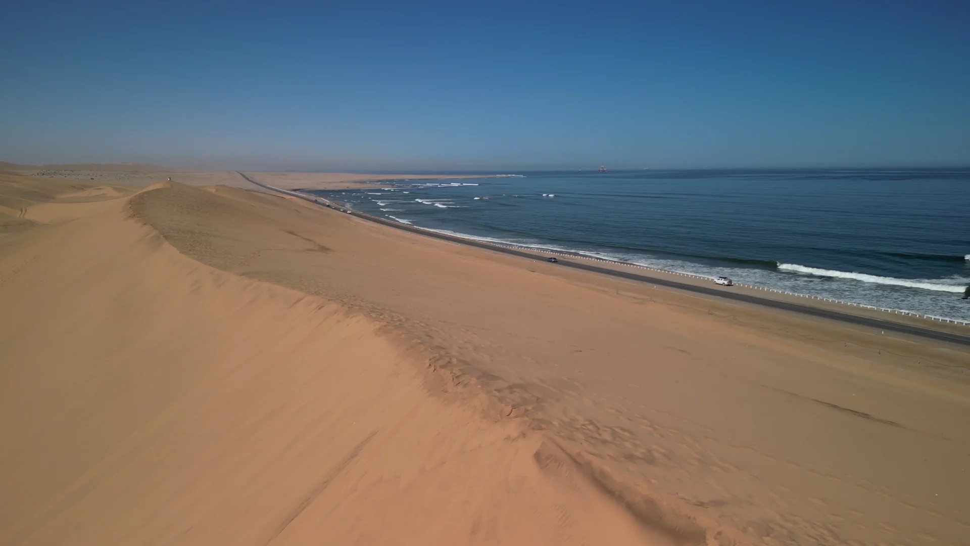 Namib desert dunes meeting the Atlantic Ocean